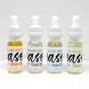 Quatre bouteilles de 200mg CBD Vape Liquid - Ease disponibles dans un dispensaire de premier ordre avec différents arômes.