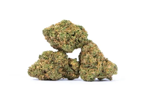 A pile of Moby Dick Strain on a white background sold at a cheap dispensary near me.